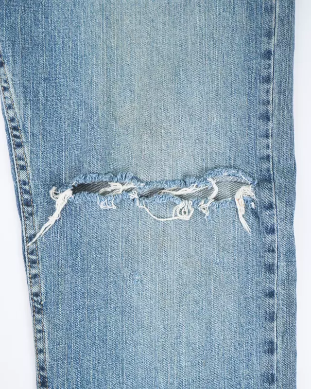 Light Wash Distressed Knee-Rip Relaxed-Fit Jeans