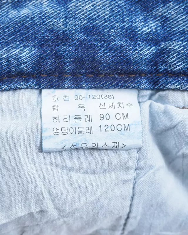 Medium Wash Pleated-Front Wide-Leg Denim Jeans