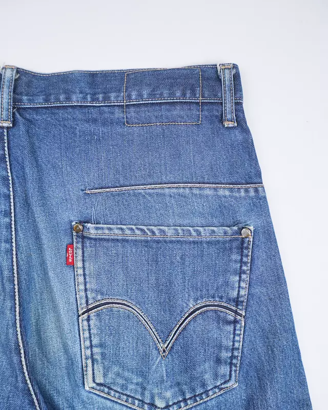 Medium Wash Twisted-Seam Engineered Relaxed Jeans
