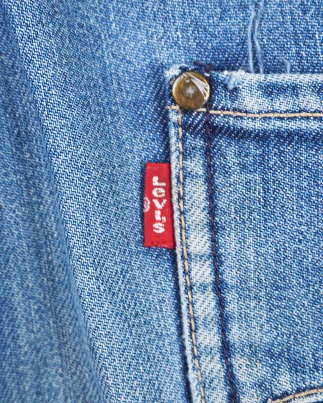 Medium Wash Twisted-Seam Engineered Relaxed Jeans