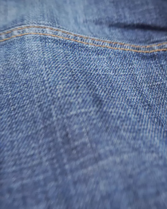 Medium Wash Multi-Pocket Moto-Style Jeans