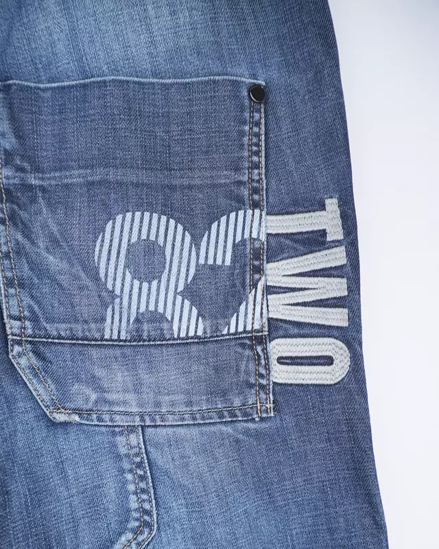 Medium Wash Multi-Pocket Moto-Style Jeans