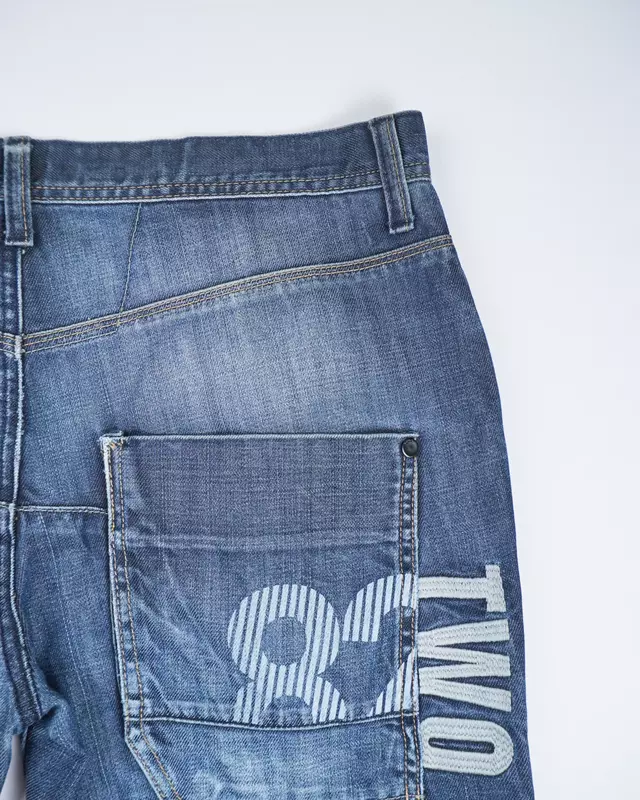 Medium Wash Multi-Pocket Moto-Style Jeans